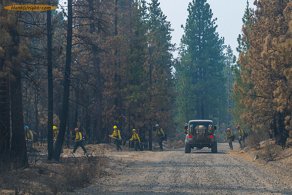 Fire fighters returning from battling a flare up